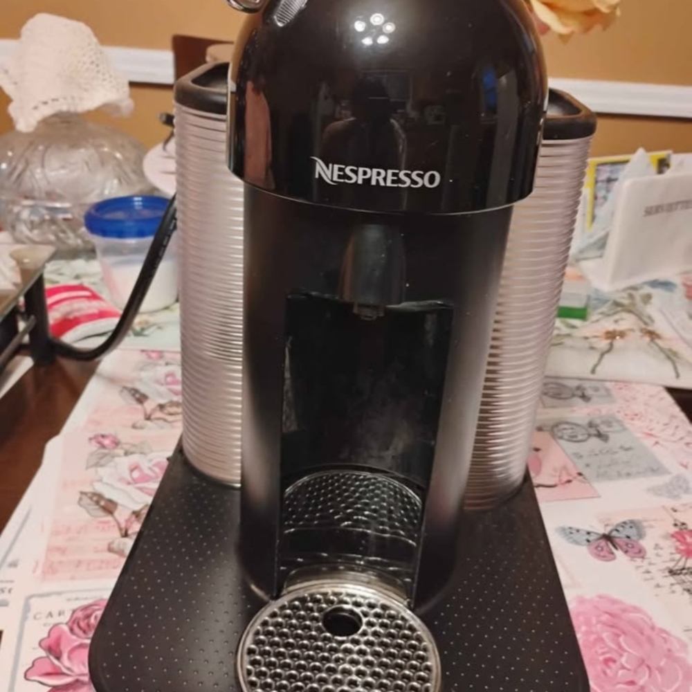 Nespresso Black and Silver Coffee Maker